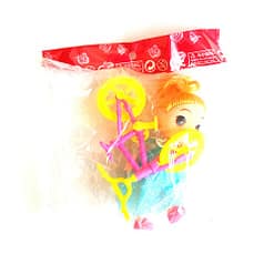 Muñeca con bicicleta en bolsa